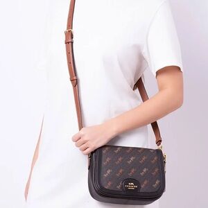 COACH SADDLE BAG WITH HORSE AND CARRIAGE DOT PRINT